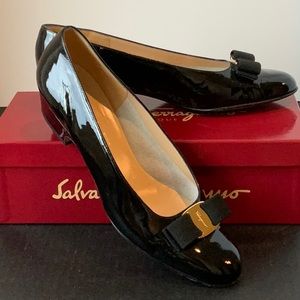 Classic Ferragamo black patent leather low healed shoes.  Gently used- no scuffs
